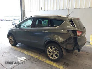 2016 Ford Escape Titanium with VIN 1FMCU9J92GUB63525, listed as a IAAI auction lot 41469824 with 156,773 mi miles. Bid and sale history available at carsss.com. Image 3.