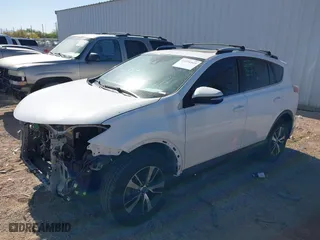 2017 Toyota RAV4 XLE with VIN JTMRFREV5HJ123412, listed as a IAAI auction lot 42018549 with 127,974 mi miles. Bid and sale history available at carsss.com. Image 2.