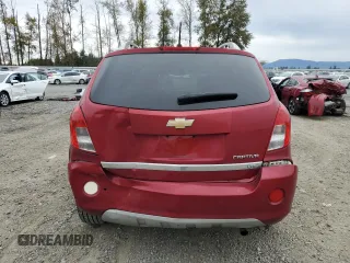 2014 Chevrolet Captiva Sport LTZ with VIN 3GNAL4EKXES679019, listed as a Copart auction lot 74091744 with 59,721 mi miles and Salvage Title. Bid and sale history available at DreamBid. Image 6.