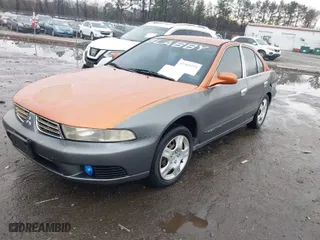 2003 Mitsubishi Galant ES with VIN 4A3AA46G83E136877, listed as a IAAI auction lot 41469411 with 307,492 mi miles. Bid and sale history available at carsss.com. Image 2.