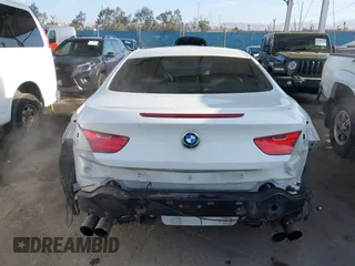 2012 BMW 6 Series 650i with VIN WBALX3C52CC528401, listed as a IAAI auction lot 42046910 with 105,844 mi miles. Bid and sale history available at carsss.com. Image 17.