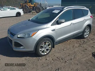 2016 Ford Escape Titanium with VIN 1FMCU9JX2GUA50916, listed as a IAAI auction lot 42118711 with 121,405 mi miles. Bid and sale history available at carsss.com. Image 18.
