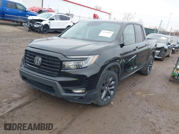 2022 Honda Ridgeline Sport with VIN 5FPYK3F15NB010408, listed as a IAAI auction lot 41538181 with 87,923 mi miles and . Bid and sale history available at DreamBid. Image 2.