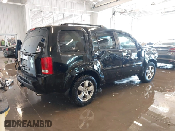 2011 Honda Pilot EX with VIN 5FNYF3H48BB055911, listed as a IAAI auction lot 41364335 with 165,445 mi miles and . Bid and sale history available at carsss.com. Image 4.