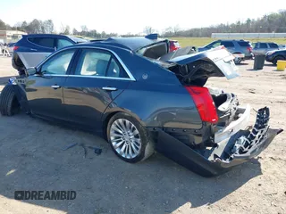 2016 Cadillac CTS Luxury Collection AWD with VIN 1G6AX5SX1G0113069, listed as a IAAI auction lot 41866529 with 54,929 mi miles and . Bid and sale history available at DreamBid. Image 3.