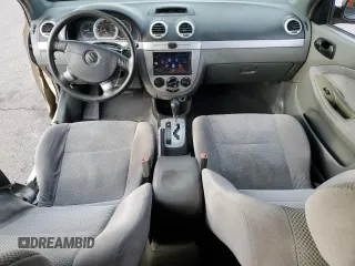 2007 Suzuki Forenza z VIN KL5JD86Z97K720530, wystawiony jako Copart lot #85948614 z przebiegiem 158 174 mil mil oraz Szkody całkowita. Historia ofert i sprzedaży dostępna na DreamBid. Obrazek 8.