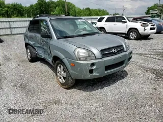 2005 Hyundai Tucson GL with VIN KM8JM12B05U148660, listed as a Copart auction lot 54302805 with 257,233 mi miles and Salvage title. Bid and sale history available at DreamBid. Image 14.