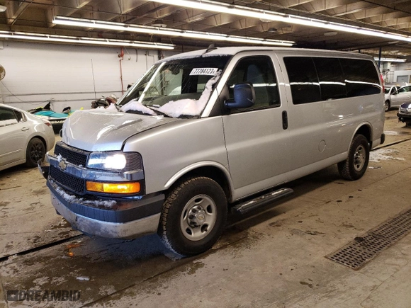 2016 Chevrolet Express Passenger LT with VIN 1GAWGFFFXG1284318, listed as a Copart auction lot 77784123 with 71,042 mi miles. Bid and sale history available at carsss.com. Image 1.
