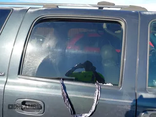 2005 GMC Yukon XL SLT with VIN 1GKEC16Z25J147760, listed as a IAAI auction lot 41220169 with 396,136 mi miles. Bid and sale history available at carsss.com. Image 6.