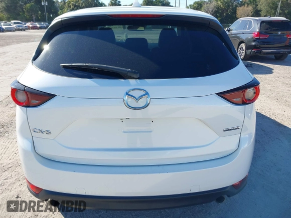 2020 Mazda CX-5 Touring with VIN JM3KFACM6L0737727, listed as a IAAI auction lot 41283200 with 85,949 mi miles and . Bid and sale history available at carsss.com. Image 16.