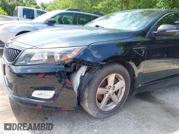 2015 Kia Optima LX with VIN 5XXGM4A75FG392731, listed as a IAAI auction lot 42792228 with 153,081 mi miles and . Bid and sale history available at DreamBid. Image 12.