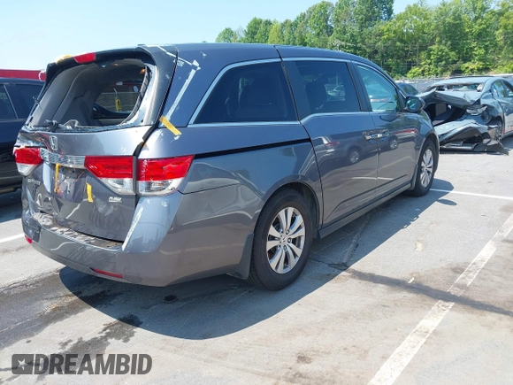 2014 Honda Odyssey EX-L with VIN 5FNRL5H63EB073585, listed as a IAAI auction lot 42673004 with 119,971 mi miles and . Bid and sale history available at DreamBid. Image 4.