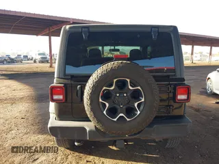 2021 Jeep Wrangler Sport S with VIN 1C4GJXAN5MW725966, listed as a IAAI auction lot 41144645 with 38,286 mi miles and . Bid and sale history available at DreamBid. Image 16.