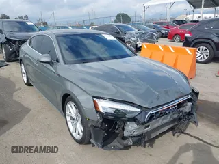 2023 Audi A5 Sportback S line Premium Plus z VIN WAUFACF50PA040074, wystawiony jako IAAI lot #41933197 z przebiegiem 21 871 mil mil oraz . Historia ofert i sprzedaży dostępna na DreamBid. Obrazek 1.