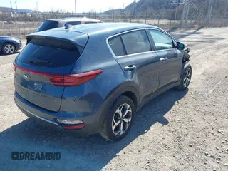 2020 Kia Sportage LX with VIN KNDPMCAC8L7765627, listed as a IAAI auction lot 41856507 with 57,968 mi miles. Bid and sale history available at carsss.com. Image 4.