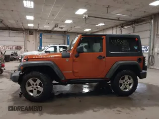 2011 Jeep Wrangler Rubicon with VIN 1J4BA6D15BL624268, listed as a IAAI auction lot 41430121 with 142,433 mi miles and . Bid and sale history available at carsss.com. Image 15.