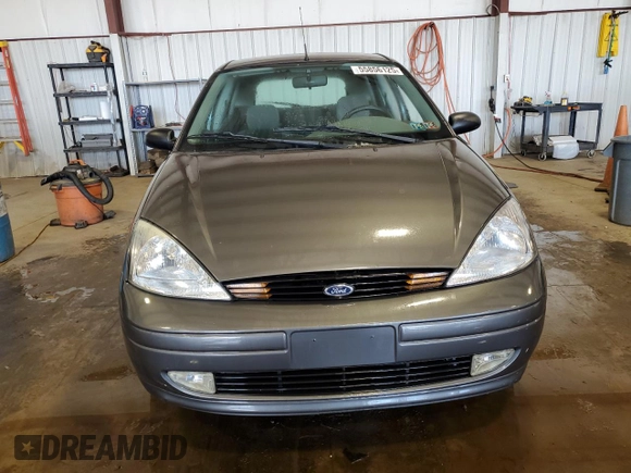 2002 Ford Focus ZX5 z VIN 3FAFP37352R180981, wystawiony jako Copart lot #55856125 z przebiegiem 59 785 mil mil oraz Szkoda całkowita • Salvage title. Historia ofert i sprzedaży dostępna na DreamBid. Obrazek 5.