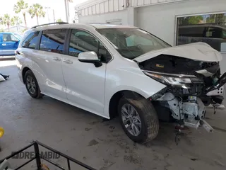 2023 Toyota Sienna XLE with VIN 5TDYRKEC9PS176415, listed as a IAAI auction lot 42154654 with 35,739 mi miles and . Bid and sale history available at DreamBid. Image 1.