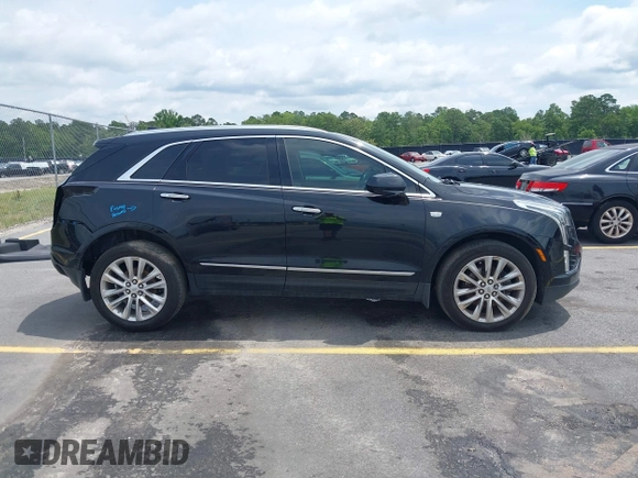 2017 Cadillac XT5 Platinum AWD z VIN 1GYKNFRS9HZ125677, wystawiony jako IAAI lot #42366784 z przebiegiem 152 116 mil mil oraz . Historia ofert i sprzedaży dostępna na DreamBid. Obrazek 14.