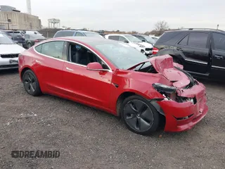 2018 Tesla Model 3 Long Range Battery with VIN 5YJ3E1EA4JF159743, listed as a IAAI auction lot 40839991 with 117,039 mi miles. Bid and sale history available at carsss.com. Image 1.