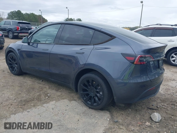 2023 Tesla Model Y Long Range with VIN 7SAYGDEE3PA177437, listed as a IAAI auction lot 41813483 with 17,093 mi miles. Bid and sale history available at carsss.com. Image 3.