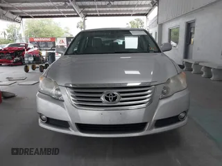 2009 Toyota Avalon XL with VIN 4T1BK36B69U341854, listed as a IAAI auction lot 41727553 with 102,369 mi miles. Bid and sale history available at carsss.com. Image 12.