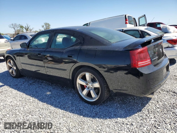 2006 Dodge Charger SRT-8 with VIN 2B3KA73W16H476021, listed as a Copart auction lot 49822835 with 197,111 mi miles and Salvage Title. Bid and sale history available at DreamBid. Image 2.