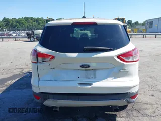 2013 Ford Escape SE with VIN 1FMCU0GX2DUB85361, listed as a IAAI auction lot 42552881 with 211,032 mi miles and . Bid and sale history available at DreamBid. Image 6.