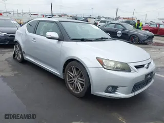 2011 Scion tC with VIN JTKJF5C72B3011102, listed as a IAAI auction lot 41712417 with 270,963 mi miles. Bid and sale history available at carsss.com. Image 1.