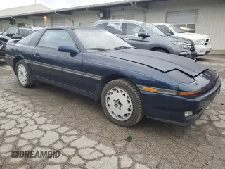 1988 Toyota Supra z VIN JT2MA71J0J0087102, wystawiony jako Copart lot #78730904 z przebiegiem 83 787 mil mil oraz Czysty tytuł • Clean title. Historia ofert i sprzedaży dostępna na DreamBid. Obrazek 4.