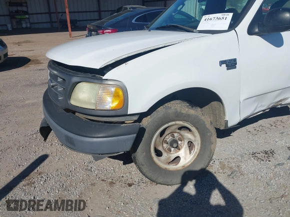 2003 Ford F-150 XL with VIN 2FTRF17W03CA59388, listed as a IAAI auction lot 41673651 with 221,668 mi miles and . Bid and sale history available at DreamBid. Image 14.