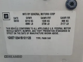 2001 Cadillac Eldorado Touring ETC z VIN 1G6ET12941B101128, wystawiony jako Copart lot #73832624 z przebiegiem Nie podano mil oraz Nie do naprawy. Historia ofert i sprzedaży dostępna na DreamBid. Obrazek 13.