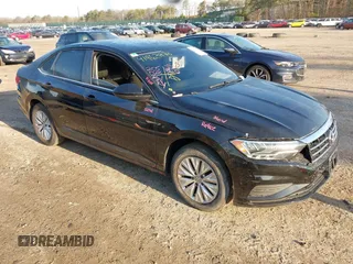2019 Volkswagen Jetta S z VIN 3VWCB7BU6KM144584, wystawiony jako IAAI lot #41963870 z przebiegiem 205 028 mil mil oraz . Historia ofert i sprzedaży dostępna na DreamBid. Obrazek 1.