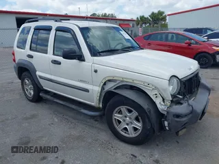 2004 Jeep Liberty Sport with VIN 1J4GK48K54W153217, listed as a IAAI auction lot 42071897 with 106,921 mi miles and . Bid and sale history available at carsss.com. Image 1.