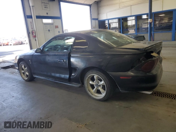 1997 Ford Mustang with VIN 1FALP4047VF158249, listed as a Copart auction lot 55669455 with 175,458 mi miles and Salvage title. Bid and sale history available at DreamBid. Image 2.