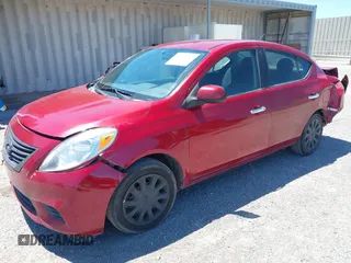 2013 Nissan Versa S Plus with VIN 3N1CN7AP9DL882011, listed as a IAAI auction lot 42239373 with 210,820 mi miles and . Bid and sale history available at DreamBid. Image 2.