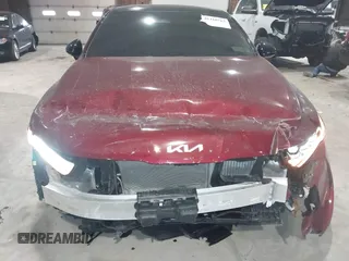 2022 Kia K5 GT-Line z VIN 5XXG64J26NG132254, wystawiony jako IAAI lot #41410563 z przebiegiem 29 345 mil mil oraz . Historia ofert i sprzedaży dostępna na DreamBid. Obrazek 6.