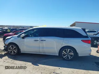2023 Honda Odyssey Touring with VIN 5FNRL6H88PB003865, listed as a IAAI auction lot 41715384 with 40,765 mi miles and . Bid and sale history available at DreamBid. Image 14.
