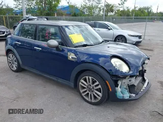 2017 MINI Hardtop 4 Door Cooper with VIN WMWXU1C54H2E19114, listed as a IAAI auction lot 42107266 with 83,524 mi miles and . Bid and sale history available at DreamBid. Image 1.