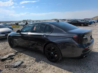 2011 BMW 7 Series 750i with VIN WBAKA8C59BCY36660, listed as a Copart auction lot 64260145 with 121,047 mi miles and Clean title. Bid and sale history available at DreamBid. Image 2.