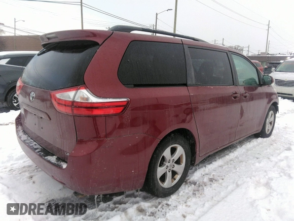2016 Toyota Sienna LE AAS with VIN 5TDKK3DC3GS716259, listed as a IAAI auction lot 41556959 with 130,478 mi miles. Bid and sale history available at carsss.com. Image 4.