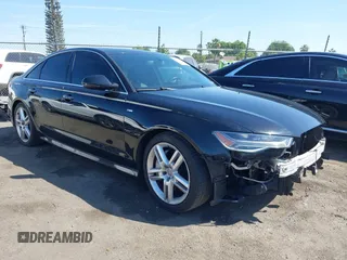 2016 Audi A6 Premium Plus z VIN WAUGFAFC0GN122291, wystawiony jako IAAI lot #42212208 z przebiegiem 106 970 mil mil oraz . Historia ofert i sprzedaży dostępna na DreamBid. Obrazek 14.