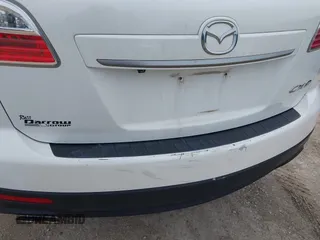 2012 Mazda CX-9 Touring with VIN JM3TB2CA2C0340236, listed as a IAAI auction lot 41938986 with 151,572 mi miles and . Bid and sale history available at carsss.com. Image 6.