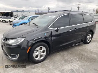 2018 Chrysler Pacifica Hybrid Touring Plus с VIN 2C4RC1H72JR124980, выставлен на аукционе Copart как лот 72265314 с пробегом 167 871 миль миль и Списание • Salvage title. История ставок и продаж доступна на DreamBid. Изображение 1.