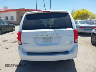 2014 Dodge Grand Caravan SXT with VIN 2C4RDGCG1ER429495, listed as a IAAI auction lot 42058513 with 136,936 mi miles and . Bid and sale history available at DreamBid. Image 16.