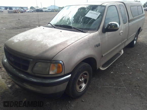 1997 Ford F-150 with VIN 1FTDX17W6VKB77743, listed as a IAAI auction lot 42633936 with 111,152 mi miles and . Bid and sale history available at DreamBid. Image 2.