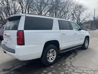 2016 Chevrolet Suburban LT with VIN 1GNSKHKC9GR311870, listed as a IAAI auction lot 41821574 with 245,820 mi miles. Bid and sale history available at carsss.com. Image 4.