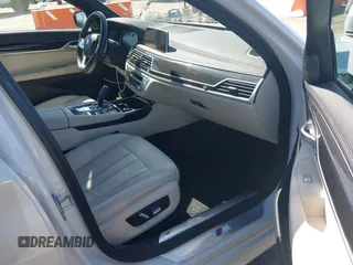 2019 BMW 7 Series 740i with VIN WBA7E2C53KB454816, listed as a IAAI auction lot 42539294 with 73,363 mi miles and . Bid and sale history available at DreamBid. Image 5.