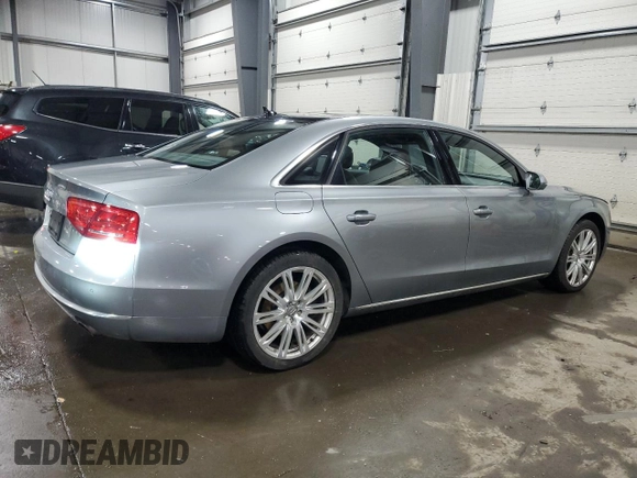 2014 Audi A8 3.0T z VIN WAURGAFD7EN005416, wystawiony jako Copart lot #42625745 z przebiegiem 141 244 mil mil oraz Szkoda całkowita • Salvage title. Historia ofert i sprzedaży dostępna na DreamBid. Obrazek 3.