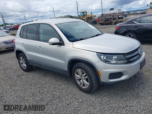 2013 Volkswagen Tiguan SEL with VIN WVGBV3AX1DW571843, listed as a IAAI auction lot 42540191 with 140,639 mi miles and . Bid and sale history available at DreamBid. Image 1.